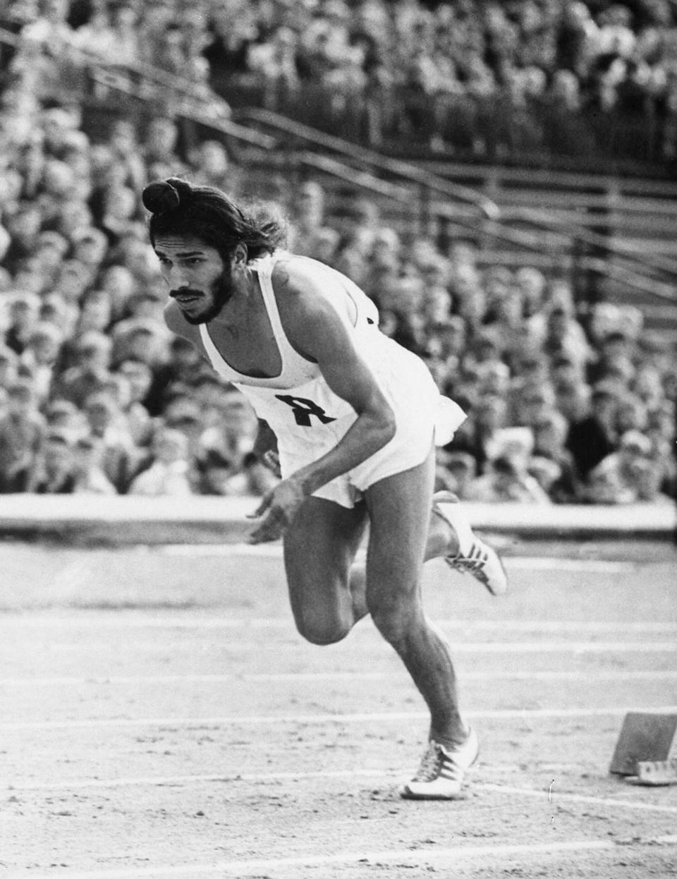 FILE - In this June 20, 1961, file photo, Milkha Singh, the famed Indian middle-distance runner, starts the 400 metres race in the Janusz Kusocinski Memorial Track and Field MeetinG, in Warsaw, Poland. Singh, one of India’s first sport superstars and ace sprinter who overcame a childhood tragedy to become the country's most celebrated athlete, has died. He was 91. Singh's family said he died late Friday, June 18, 2021, of complications from COVID-19 in a hospital in the northern city of Chandigarh. (AP Photo/File)