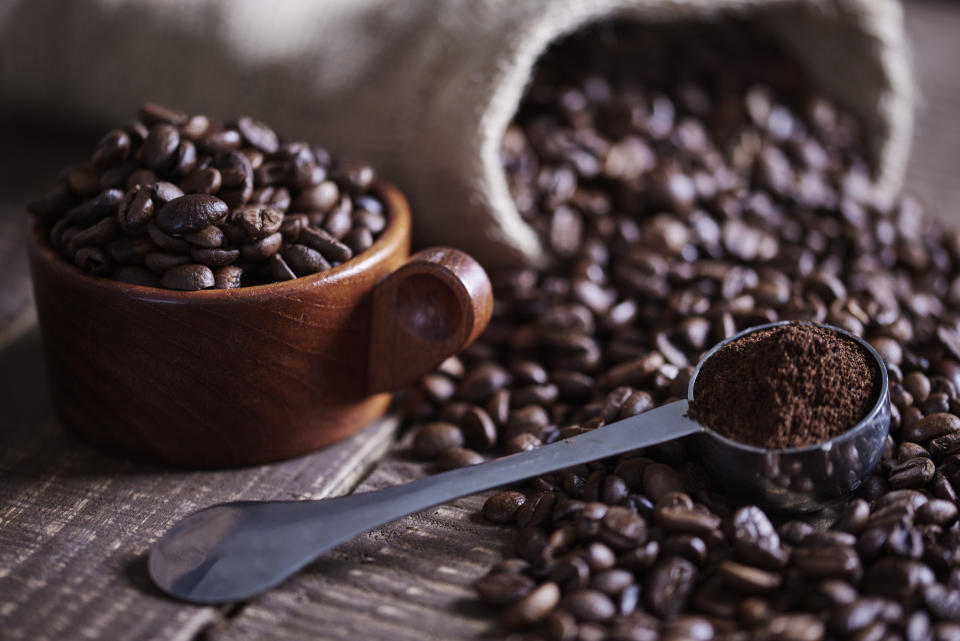 Beans of coffee and jute bag