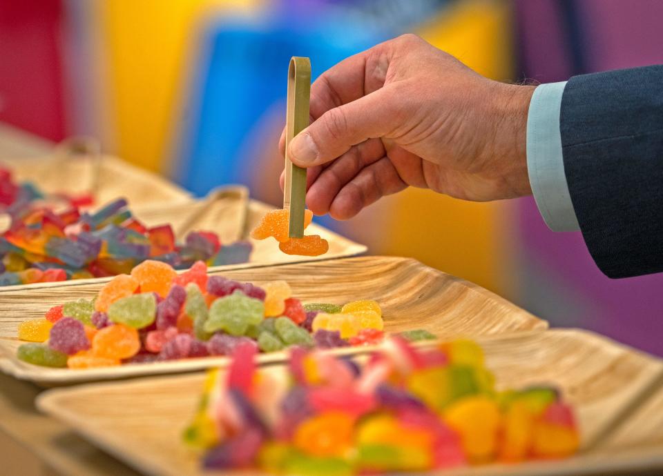 Plant-based gummies are tasted at the Katjes booth during The Sweet & Snacks Expo, Tuesday, May 14, 2024 at the Indiana Convention Center.