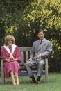 <p>The royal couple relaxes in the Kensington Palace gardens on June 12, 1984. </p>