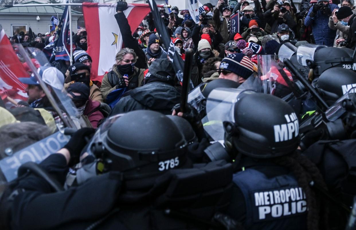 <p>Washington DC police and pro-Trump demonstrators clash at the United States Capitol during the Pro-Trump rally. </p><p> </p> (Rex Features)