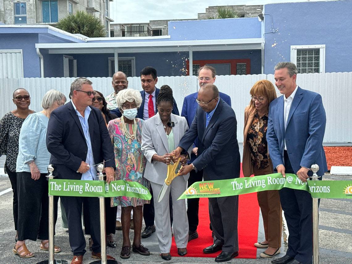 New Horizons Community Mental Health Center CEO Michele Wyatt-Sweeting and William Kelley, president of New Horizon’s Board of directors, participate in a ribbon-cutting ceremony for the center’s new Living Room facility on Wednesday, May 1, 2024.