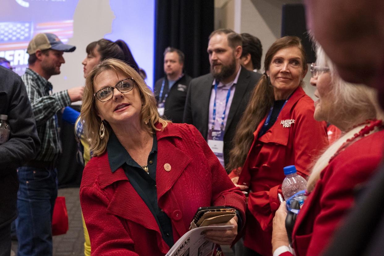 Sen. Kelly Townsend, left, revived a bill to kill early voting in Arizona. It passed on a party line vote.