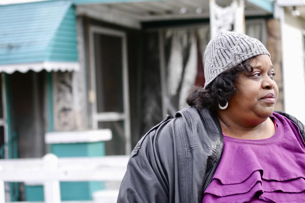 Activist Keisha Brown in front of her house in Harriman Park in Birmingham, Alabama. (Photo: Katherine Webb-Hehn)