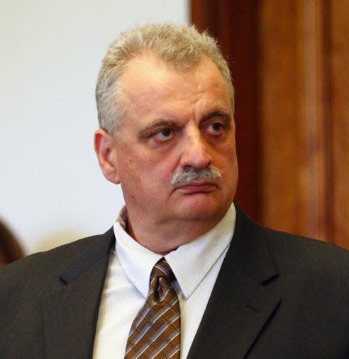 Dr. James Bressi appears in Summit County Common Pleas Court during his 2014 trial on charges of rape and gross sexual imposition