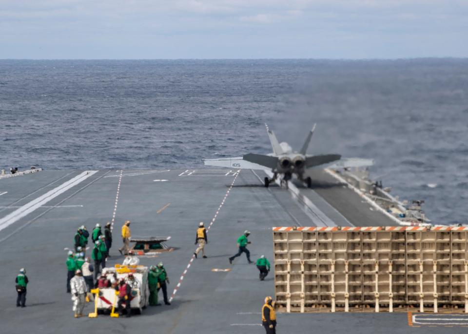 F/A-18E fighter jet on aircraft carrier Gerald R. Ford