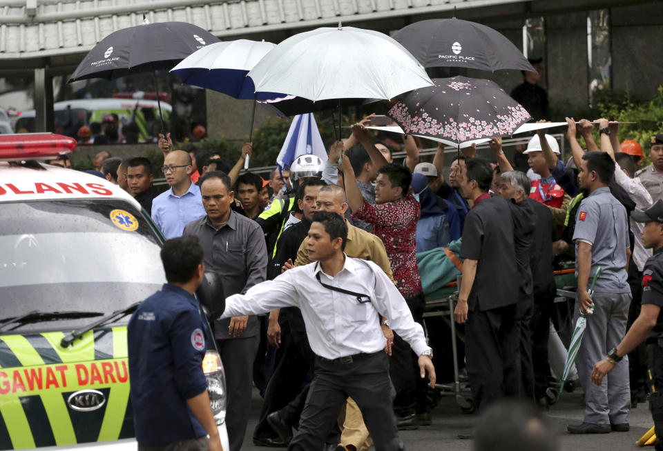 Rescuers help injured person