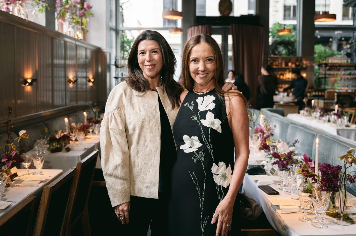 two women standing together