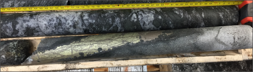 <i><strong>Figure 5: Massive chalcopyrite-pyrrhotite vein intersected infilled in brecciated pyroxenite in Hole DH24-04 (76.8m - 77.1m).</strong></i>