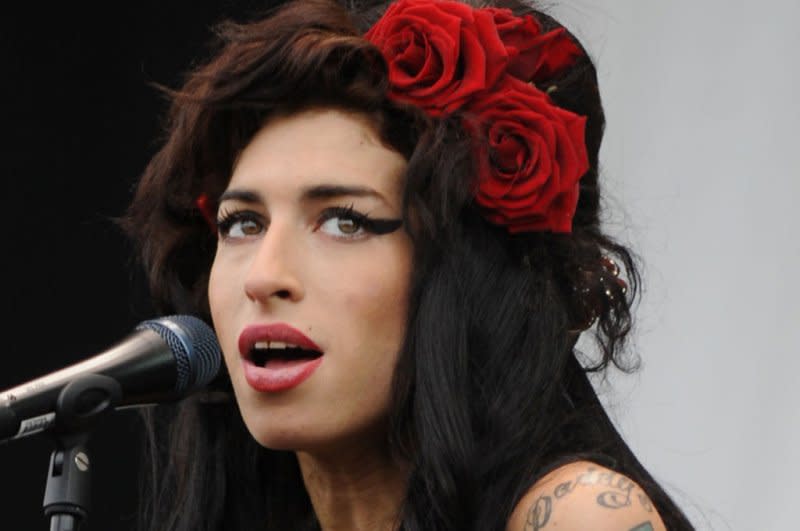 Nick Cave and Warren Ellis released "Song for Amy," a song for the Amy Winehouse biopic "Back to Black." Winehouse (pictured) died at age 27 in 2011. File Photo by Rune Hellestad/UPI