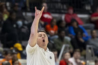 UTEP head coach Joe Golding signals in to his players during the first half of an NCAA college basketball game against Western Kentucky at the Conference USA Tournament final, Saturday, March 16, 2024, in Huntsville, Ala. (AP Photo/Vasha Hunt)