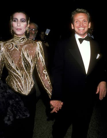 <p>Ron Galella/Ron Galella Collection via Getty Images</p> Cher and Bob Mackie in 1985.