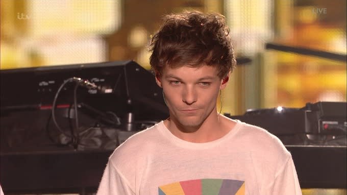 Louis bravely performed his debut solo single days after his mother’s death.