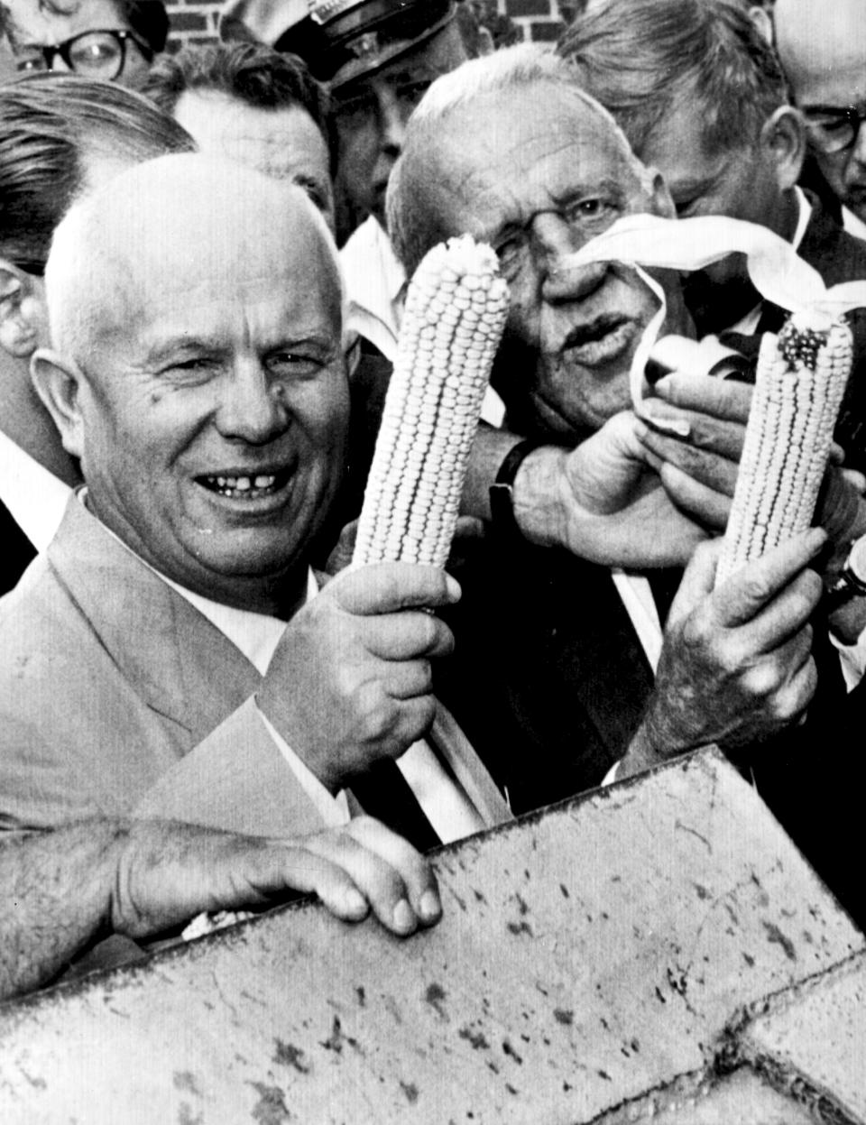 FILE - In this Sept. 23, 1959, file photo, Soviet Premier Nikita Khrushchev and Roswell Garst pose with corn cobs during an inspection tour of The Garst Farm in Coon Rapids, Iowa. Khrushchev became the first Soviet leader to visit the U.S. He traveled to Washington, New York, California and Iowa and held meetings with President Dwight Eisenhower. (AP Photo/File)