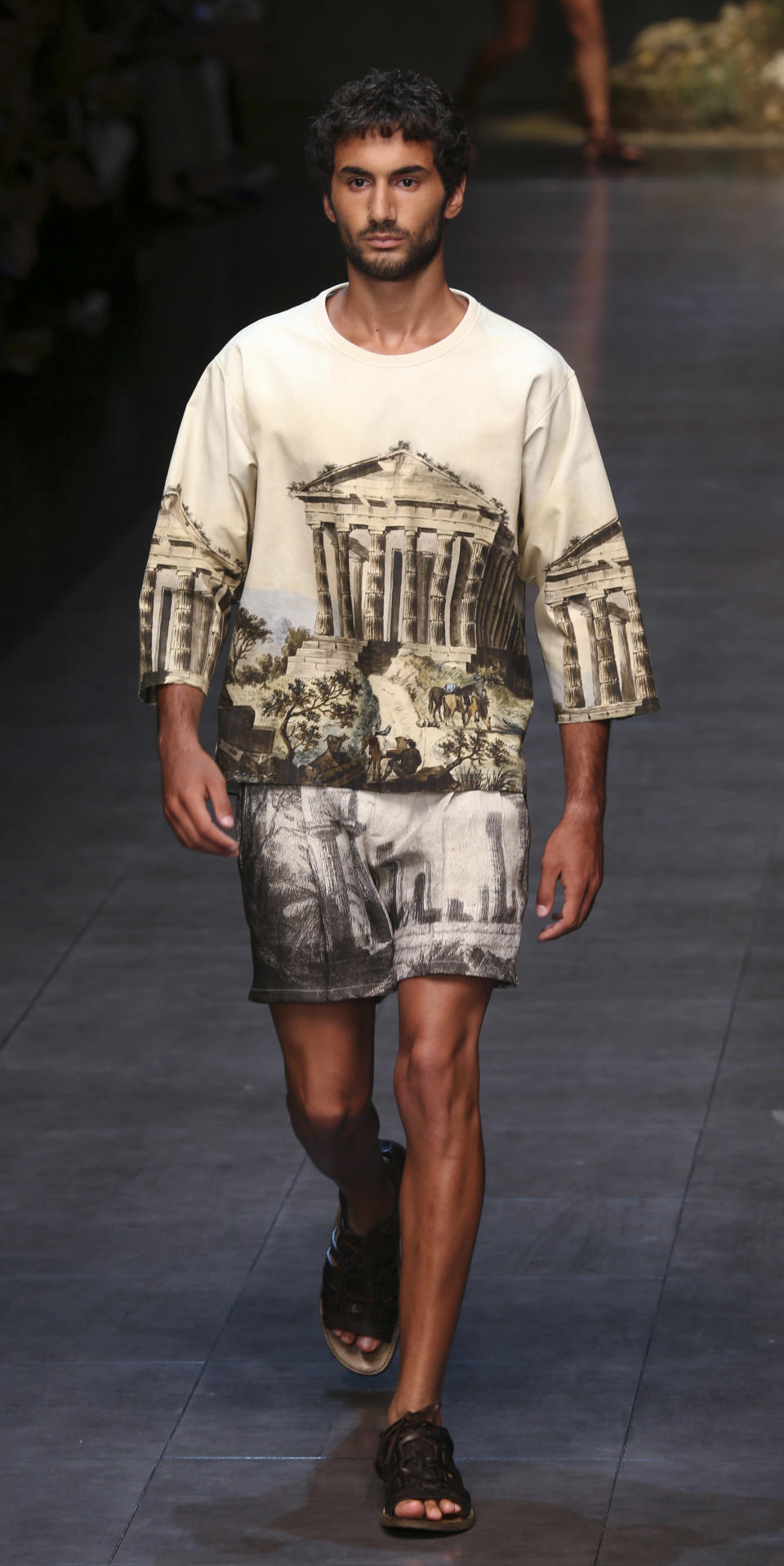 A model wears a creation of the Dolce & Gabbana men's Spring-Summer 2014 collection, part of the Milan Fashion Week, unveiled in Milan, Italy, Saturday, June 22, 2013. (AP Photo/Luca Bruno)