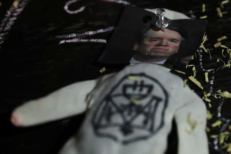 An effigy of U.S. Supreme Court Justice Brett Kavanaugh sits at an altar before a self proclaimed witch performs a hex on him at Catland Books in Brooklyn, New York, U.S., October 20, 2018. REUTERS/Shannon Stapleton