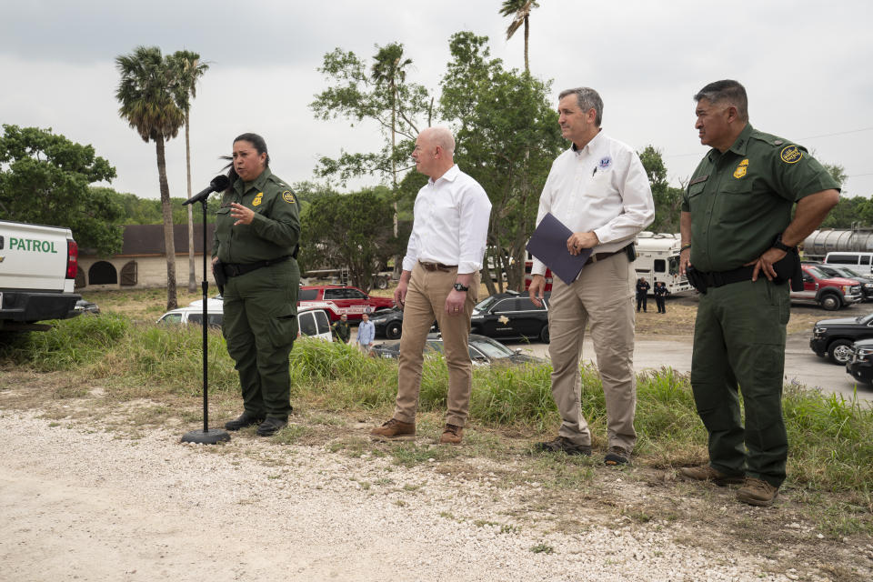 Gloria Chavez, Chief Patrol Agent, U.S. Border Patrol, RGV Sector, addresses the media at a press conference in Brownsville, Texas, Friday, May 5, 2023. U.S. Homeland Security Secretary Alejandro Mayorkas listens, third from right. (AP Photo/Veronica G. Cardenas)