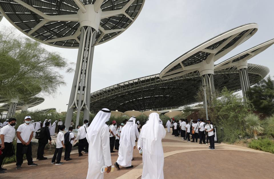 People visit the Terra, at the Sustainability Pavilion of the Dubai Expo 2020, in Dubai, United Arab Emirates, Sunday, Oct, 3, 2021. (AP Photo/Kamran Jebreili)