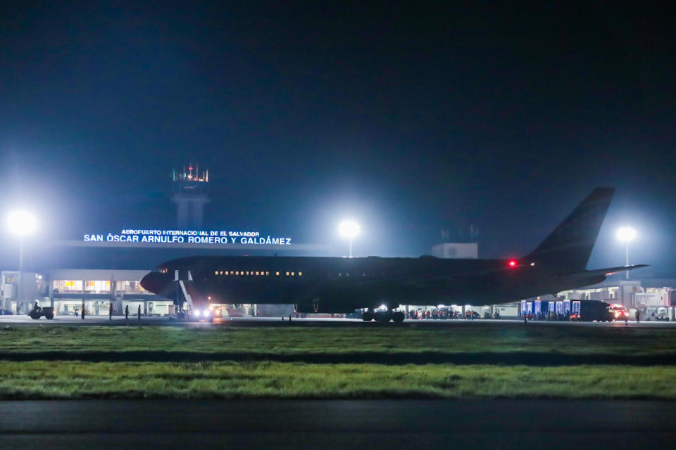 In this photo provided by El Salvador's presidential press office, The New England Patriots team plane is parked on the tarmac of the airport in San Salvador, El Salvador, late Tuesday, May 18, 2021. The team plane has delivered Chinese-made Sinovac COVID-19 vaccines. (El Salvador's presidential press office via AP)