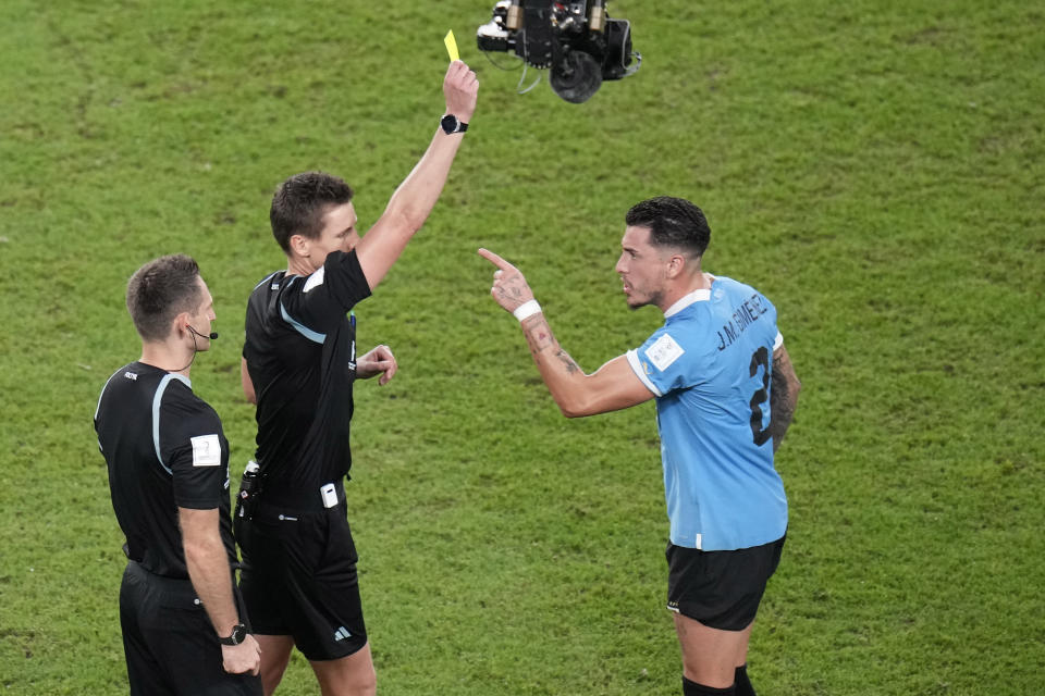 Uruguay's Jose Gimenez gestures to the referee Daniel Siebert at the end of the World Cup group H soccer match between Ghana and Uruguay, at the Al Janoub Stadium in Al Wakrah, Qatar, Friday, Dec. 2, 2022. (AP Photo/Aijaz Rahi)