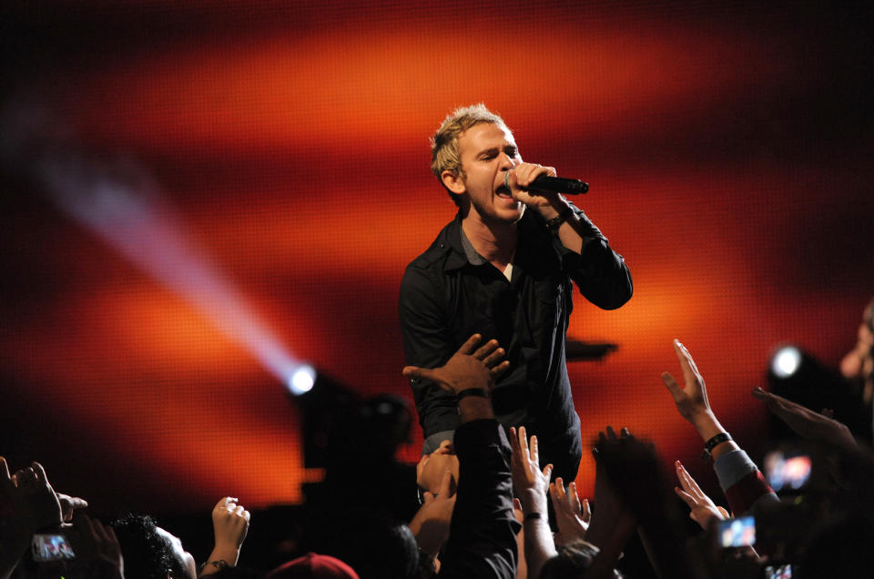 FILE - Jason Wade of Lifehouse performs at the Pepsi Smash Super Bowl Bash in Tampa on Jan. 29, 2009. In the last 30 years, only five No. 1 songs of the year have missed out at the Grammys; The Weeknd’s “Blinding Lights," Kesha's "Tik Tok," the rock-pop hit “Hanging by a Moment” from Lifehouse, the top song of 2001; R&B trio Next’s racy hit “Too Close,” which won over 1998; and the 1996 pop culture moment that was the “Macarena,” by Spanish duo Los del Río. (AP Photo/Evan Agostini, File)