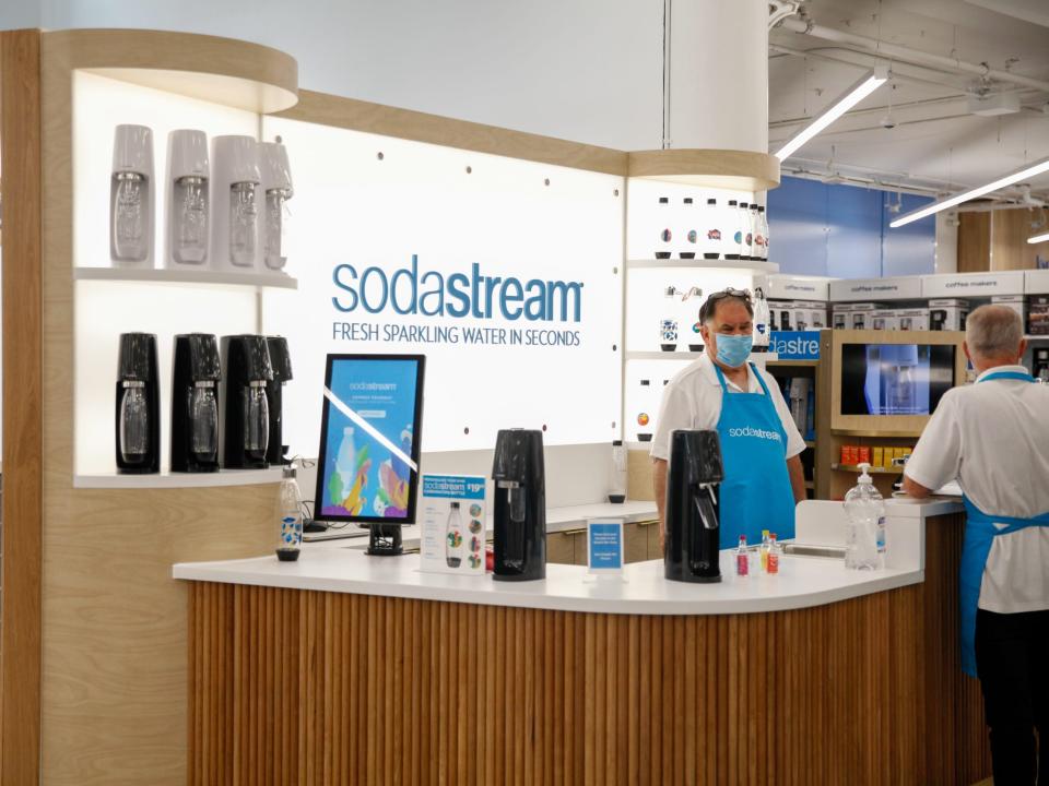 the sodastream bar with a worker