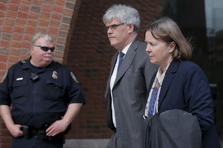 Timothy Watkins (C) and Judy Clarke (R), defense attorneys for Boston Marathon bomber Dzhokhar Tsarnaev, leave the courthouse following the first day of the defense's presentation in the penalty phase of the trial in Boston, Massachusetts, United States April 27, 2015. REUTERS/Brian Snyder