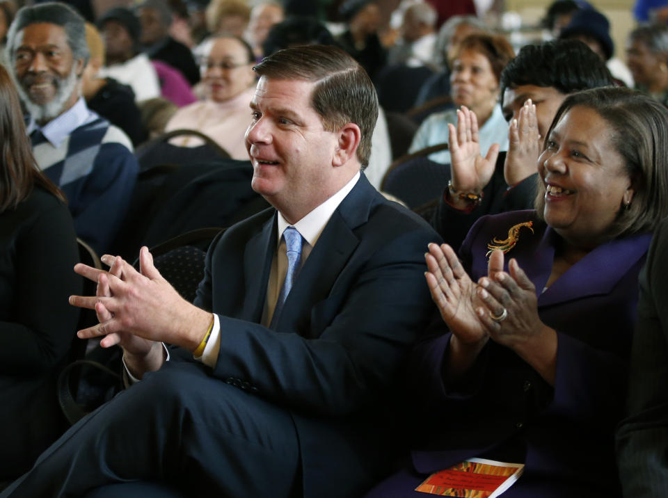 Boston Mayor Martin Walsh applauds as he attends a Black History Month event in Boston, Thursday, Feb. 27, 2014. The mayors of New York City and Boston say they'll boycott St. Patrick's Day parades to protest policies on gay groups. Walsh said this week he's trying to broker a deal with his city's parade organizers to allow a group of gay military veterans to march. The son of Irish immigrants said that allowing gay groups to participate is "long overdue." (AP Photo/Elise Amendola)