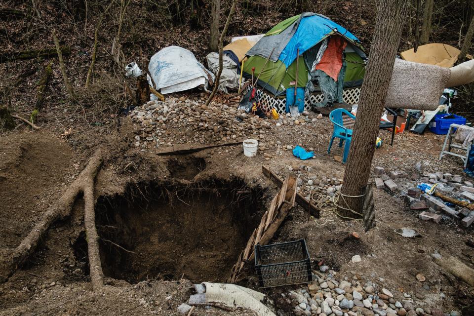 Makeshift shelters can be seen at what the City of New Philadelphia has deemed a homeless encampment off Fourth Street Extension SE on Jan. 31 in New Philadelphia. The land is private property.