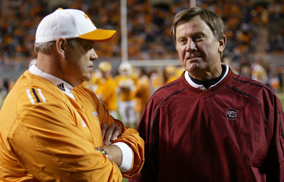 Phillip Fulmer, left, and Steve Spurrier had heated matchups in the SEC. Spurrier once derided the Volunteers' program, saying 'You can't spell CITRUS without U-T.'