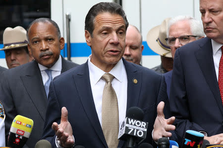 Governor of New York Andrew Cuomo gives a media briefing outside the Time Warner Center in the Manhattan borough of New York City after a suspicious package was found inside the CNN Headquarters in New York, U.S., October 24, 2018. REUTERS/Kevin Coombs