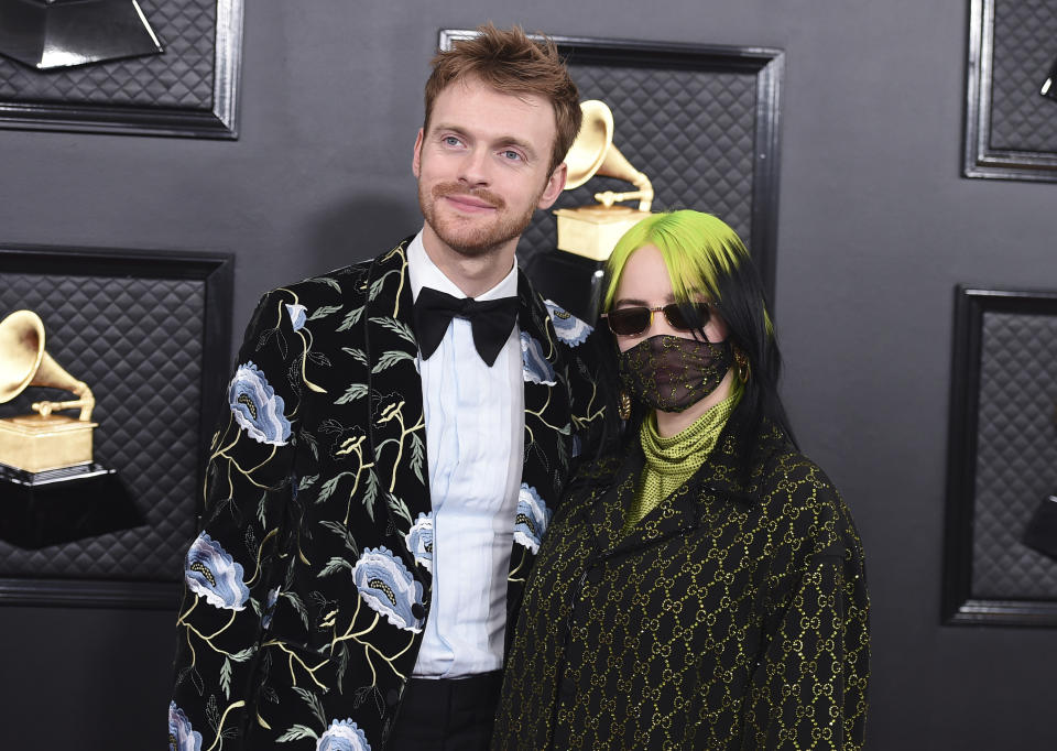 Finneas O'Connell, left, and Billie Eilish arrive at the 62nd annual Grammy Awards at the Staples Center on Sunday, Jan. 26, 2020, in Los Angeles. (Photo by Jordan Strauss/Invision/AP)