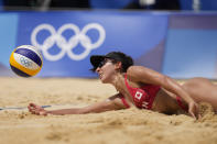 Melissa Humana-Paredes, of Canada digs out the ball during a women's beach volleyball match against Spain at the 2020 Summer Olympics, Monday, Aug. 2, 2021, in Tokyo, Japan. (AP Photo/Petros Giannakouris)