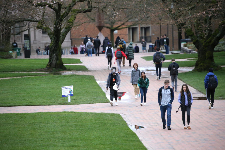 Students at the University of Washington are on campus for the last day of in-person classes on March 6, 2020 in Seattle, Washington. (Photo: Karen Ducey/Getty Images)