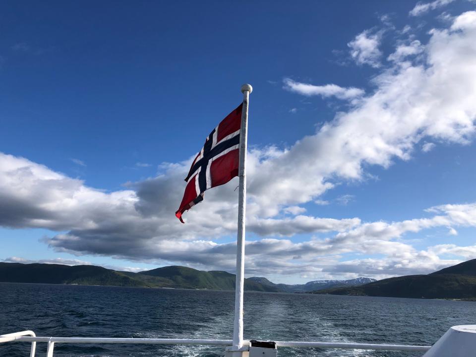 A Norway flag on the back of a ferry