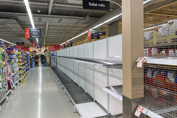 A Coles supermarket shelf usually stocked with toilet paper is seen empty here in Sydney.