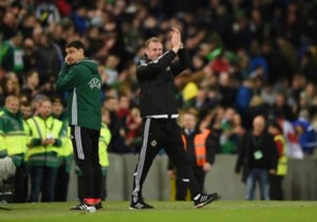 Football Soccer - Northern Ireland v Slovenia - International Friendly - Windsor Park, Belfast, Northern Ireland - 28/3/16 Northern Ireland manager Michael O'Neill applauds fans at the end of the match Action Images via Reuters / Tony O'Brien Livepic