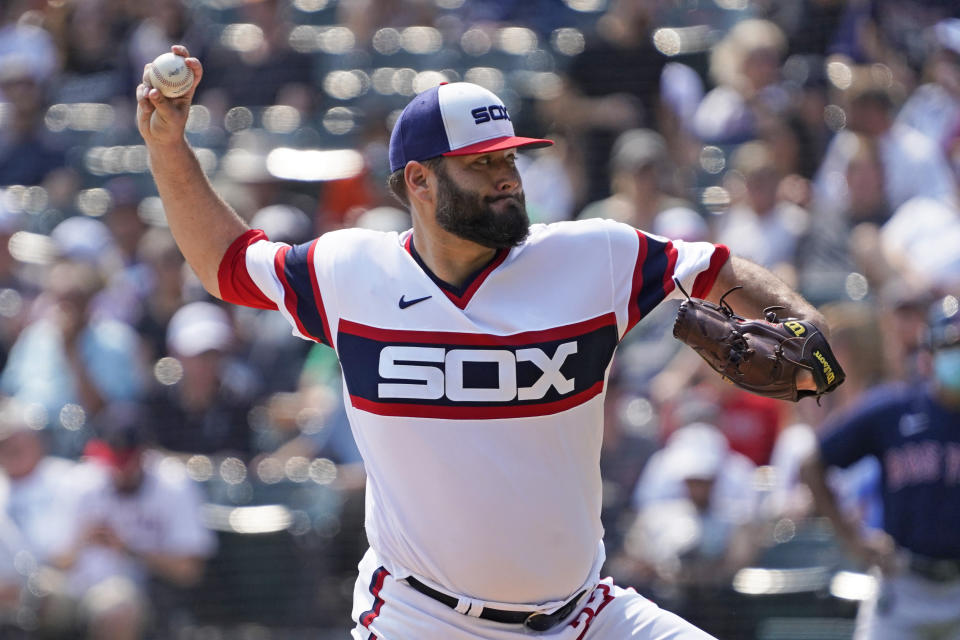 Chicago White Sox starting pitcher Lance Lynn (33) throws against the Boston Red Sox during the first inning of a baseball game, Sunday, Sept. 12, 2021, in Chicago. (AP Photo/David Banks)