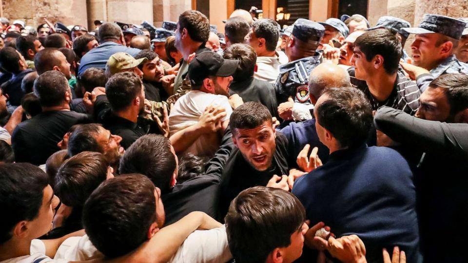 PHOTO: Demonstrators clash with police at the Armenia government building to protest against Prime Minister Nikol Pashinyan, Tuesday, Sept. 19, 2023, in Yerevan, Armenia. (Vahram Baghdasaryan/AP)