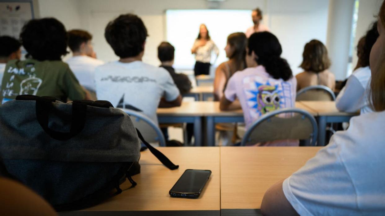 <div>Students listen to their teacher in a high school classroom on the first day of the new academic year on Sept. 4, 2023.</div> <strong>(JEFF PACHOUD/AFP via Getty Images)</strong>