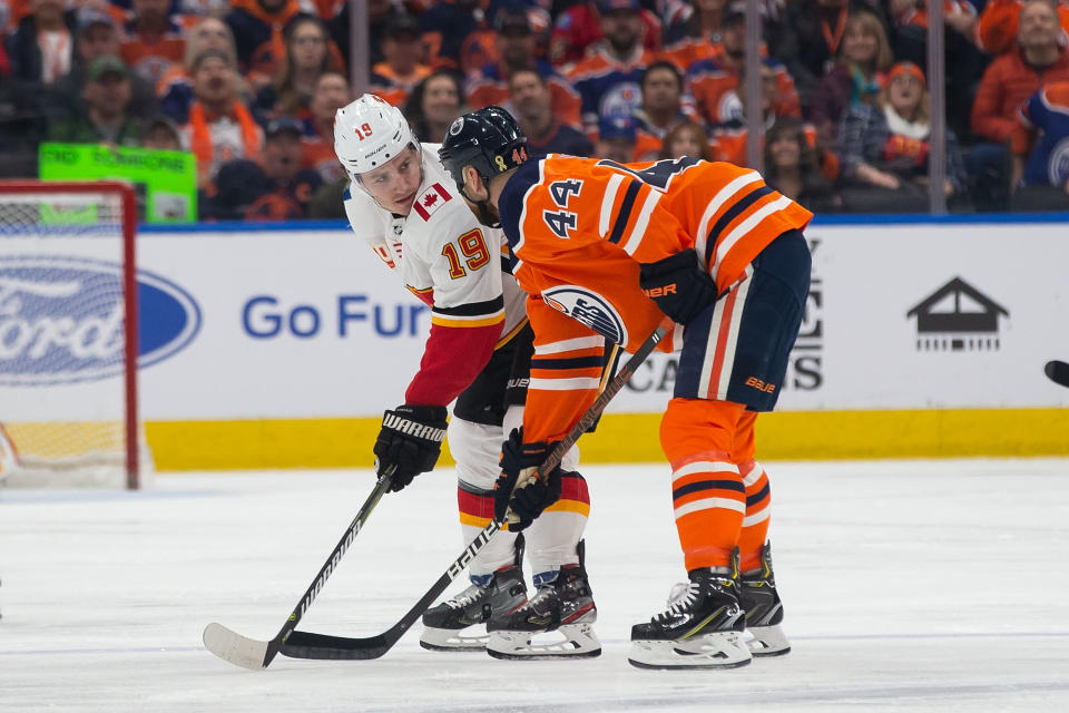 EDMONTON, AB - JANUARY 29: Zack Kassian #44 of the Edmonton Oilers has a discussion with Matthew Tkachuk #19 of the Calgary Flames at Rogers Place on January 29, 2020, in Edmonton, Canada. (Photo by Codie McLachlan/Getty Images)