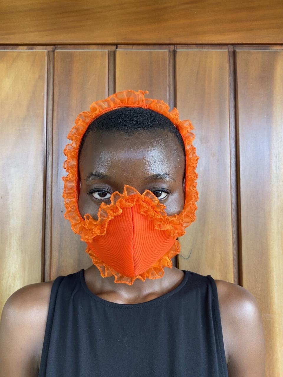 Get<a href="https://www.slashedbytia.net/shop/ruffle-face-mask" target="_blank" rel="noopener noreferrer"> the Slashed by Tia ruffle face mask for $45</a>.