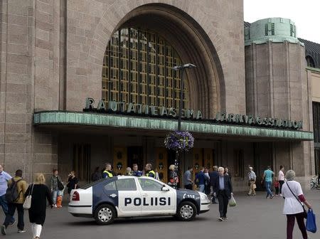 Finnish police patrol in front of the Central Railway Station, after stabbings in Turku, in Helsinki, Finland August 18, 2017. LEHTIKUVA/Linda Manner via REUTERS