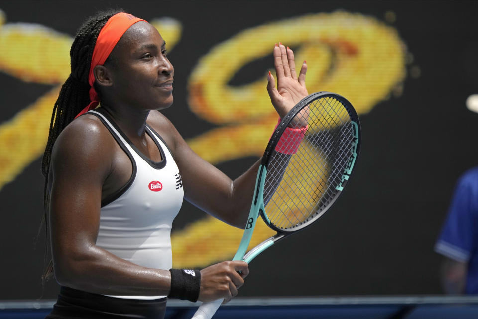 Coco Gauff of the U.S. celebrates after defeating Katerina Siniakova of the Czech Republic in their first round match at the Australian Open tennis championship in Melbourne, Australia, Monday, Jan. 16, 2023. (AP Photo/Aaron Favila)