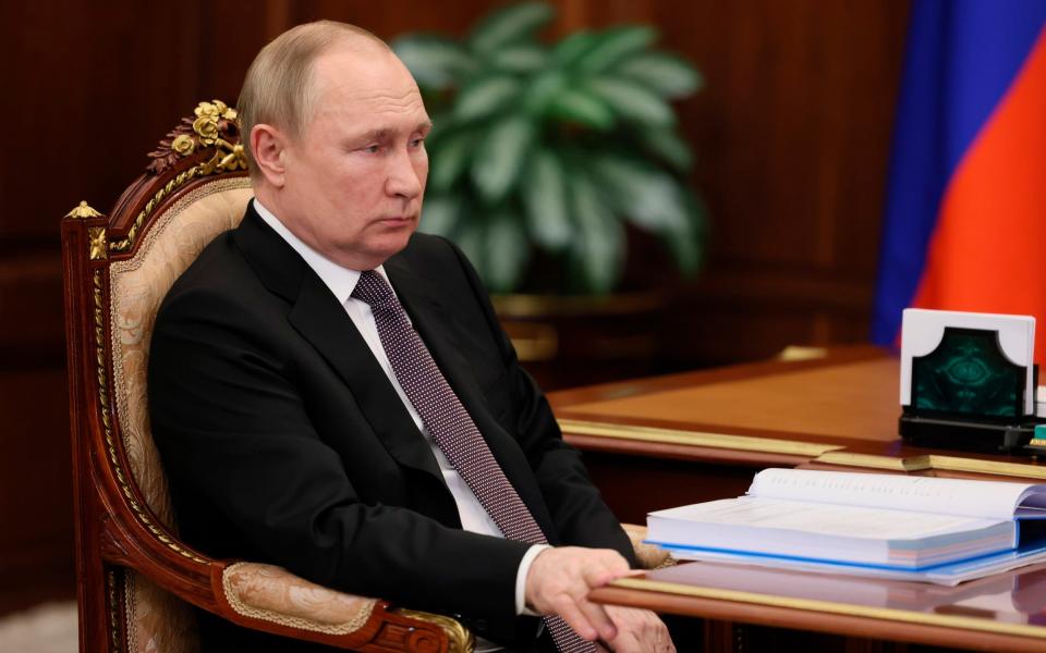 President Vladimir Putin listens to Tatyana Moskalkova, Russia's Human Rights ombudsman, during their meeting at the Kremlin in Moscow on June 6, 2022. - Mikhail Metzel/Pool Sputnik Kremlin