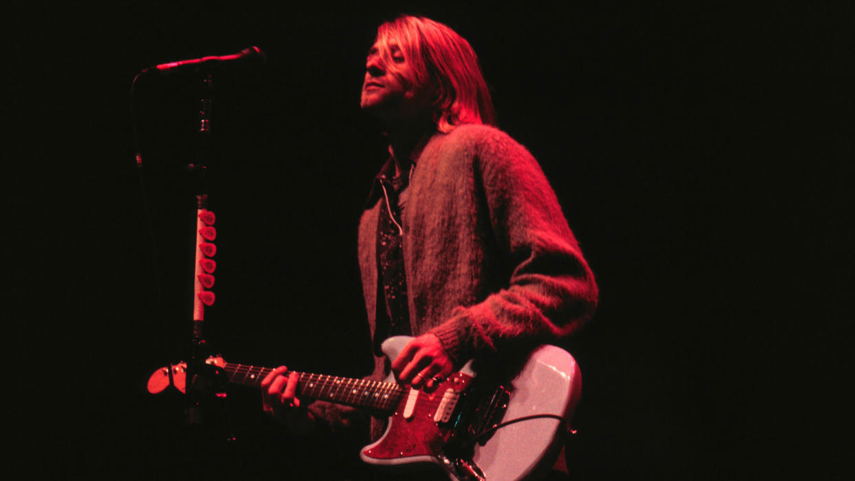  Kurt Cobain performs using his Sky Stang I Fender Mustang in December 1993. 