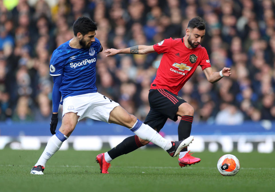 Manchester United's Bruno Fernandes (left) in action with Everton's Andre Gomes last season.