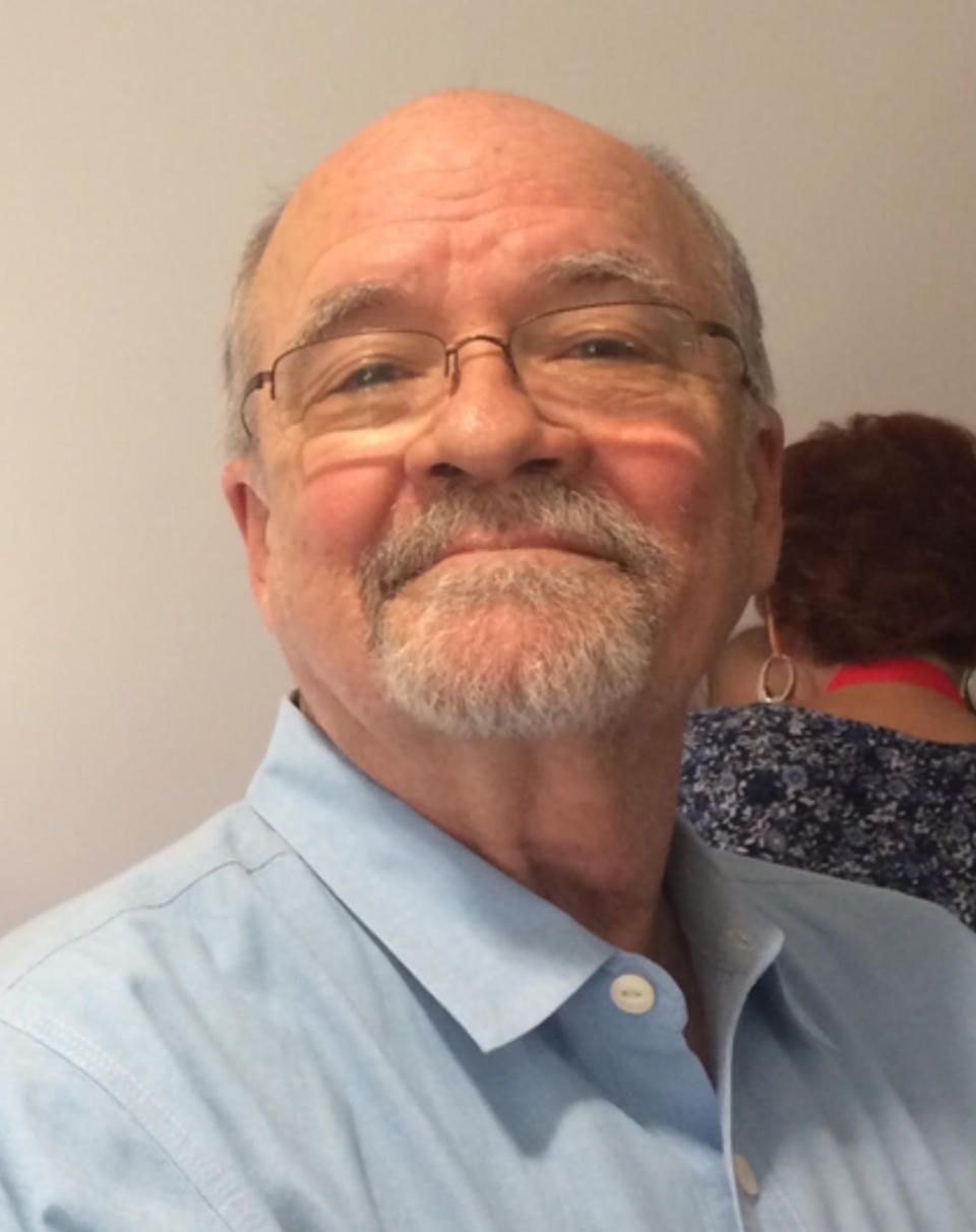 Dick Kelsey, a retired Associated Press West Regional Desk editor, is seen at his office in Phoenix in 2017. Kelsey, who was revered as much for his humor as his hardworking nature, died Thursday, March 31, 2022, after a seven-year battle with cancer. He was 76. (AP Photo/Chris Havlik)