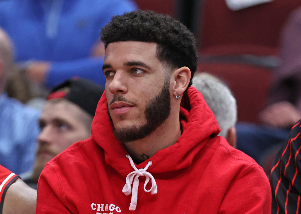 CHICAGO, ILLINOIS - APRIL 05: Lonzo Ball #2 of the Chicago Bulls watches from the bench as teammates take on the Milwaukee Bucks at the United Center on April 05, 2022 in Chicago, Illinois. The Bucks defeated the Bulls 127-106. NOTE TO USER: User expressly acknowledges and agrees that, by downloading and or using this photograph, User is consenting to the terms and conditions of the Getty Images License Agreement. (Photo by Jonathan Daniel/Getty Images)