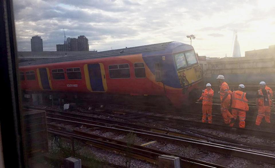 The South West Train service crashed into a nearby freight train (PA)